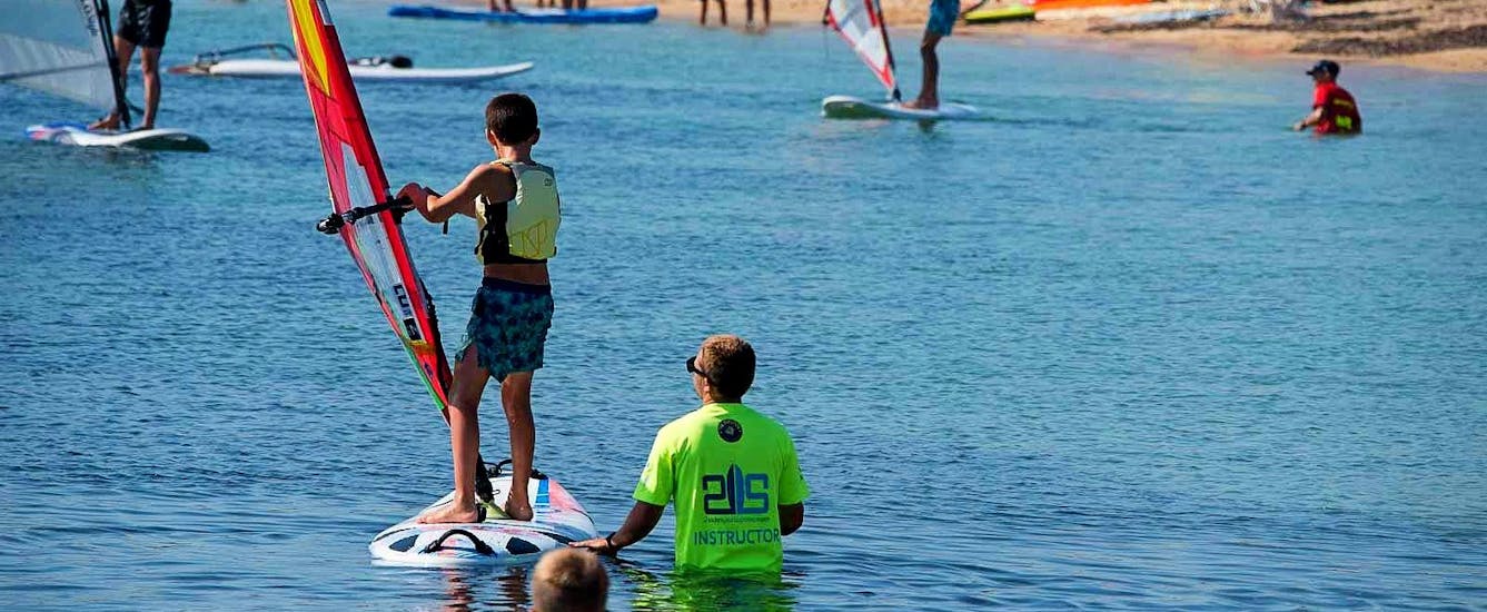 windsurfing-lessons-in-porto-pollo-for-kids-2-sides-porto-pollo-hero