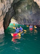 A group of friends is having fun during the Kayaking in Albufeira with SUPA Sea Adventures Algarve.