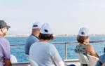Visitors enjoy the views during the Boat Tour between Cambrils and Salou organised by Estació Nàutica Costa Daurada.
