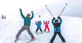 Three siblings are enjoying their Private Ski Lessons for Kids (3-14 y.) of All Levels with their instructor from Funpark Menina.