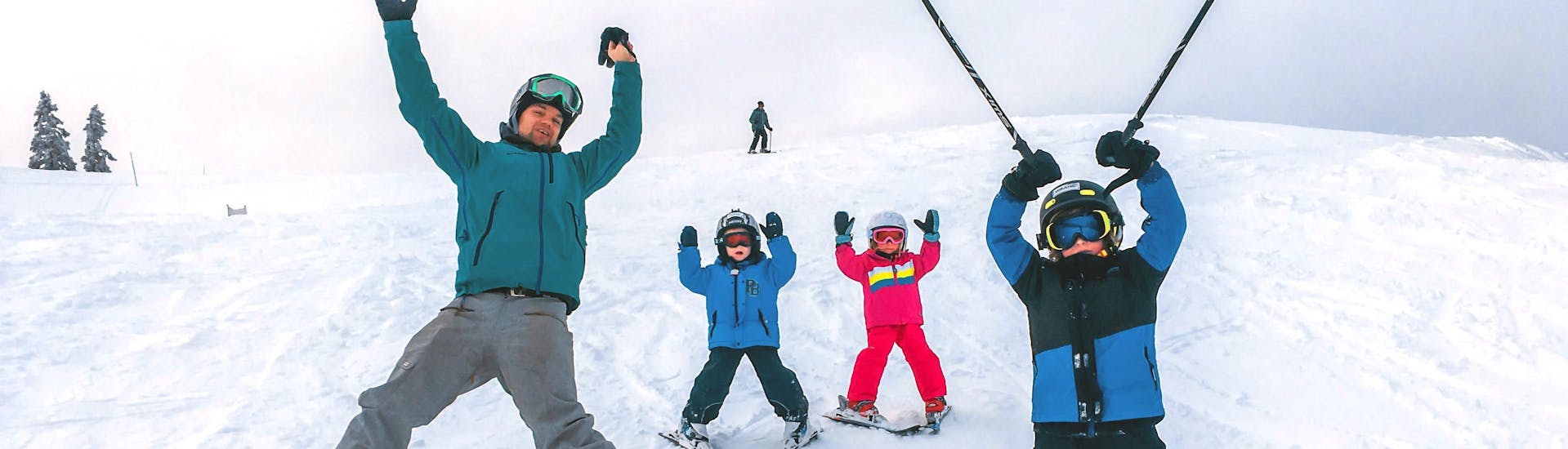 Three siblings are enjoying their Private Ski Lessons for Kids (3-14 y.) of All Levels with their instructor from Funpark Menina.
