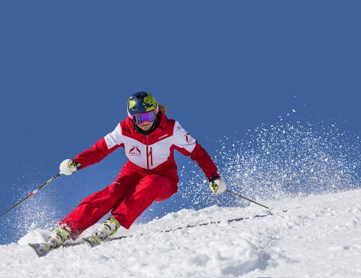 A skier enjoying the slope during his Private Ski Lessons for Adults of All Levels .