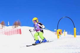 Clases de esquí para niños a partir de 8 años para avanzados con Maestri di Sci Moena.