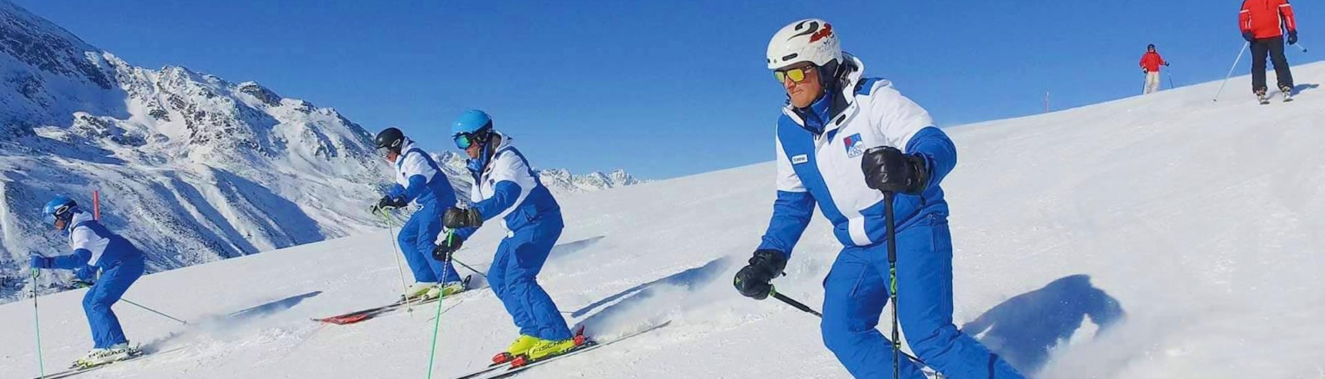 During the Adult Ski Lessons for Skiers with Experience with Schischule Hochgurgl, the certified ski instructors are demonstrating the right skiing technique.