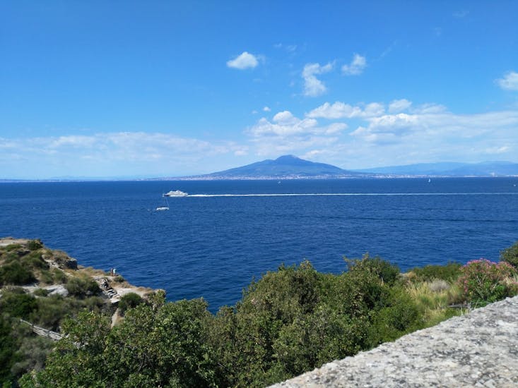 A boat trip with Vesuvius in the background is what awaits you during the Sunrise Sorrento Private Boat Tour.