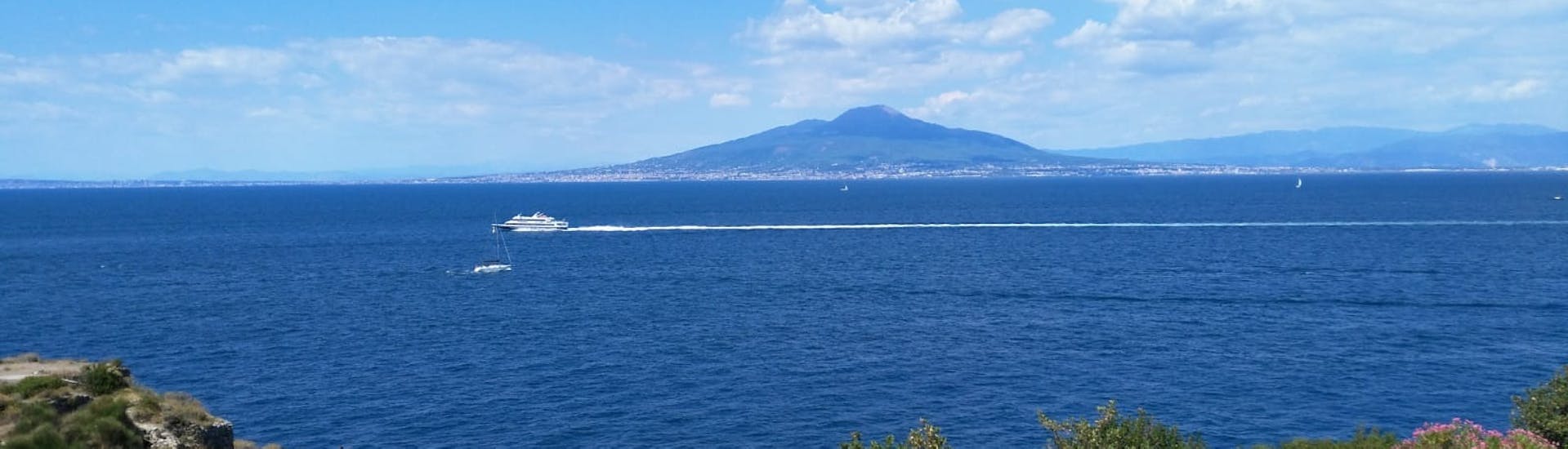 A boat trip with Vesuvius in the background is what awaits you during the Sunrise Sorrento Private Boat Tour.