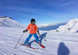 A young skier during his Private Ski Lessons for Kids of All Ages from Skischule Olympic Hugo Nindl Axamer Lizum.