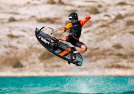 An instructor from Take Off Ibiza is riding his jetboard in Sant Antoni de Portmany.