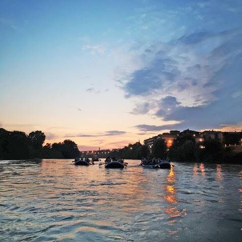 View of the Adige River by night during the Moonlight Rafting on the Adige River through Verona with Pescantina Rafting Bussolengo.