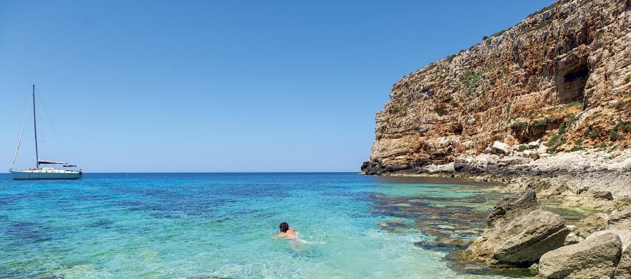 One of the breathtaking beaches where you will stop during the sailing boat trip to the Egadi Islands in low season with Mare and More Tour Trapani.