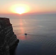 Il tramonto romantico che ammirerete dalla barca durante il giro in barca a Lampedusa con cena al tramonto con Gita in Barca Liliana Lampedusa.