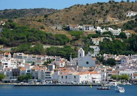 The view from the picturesque village of Port de la Selva from sea during the full day catamaran tour together with Magic Catamarans.