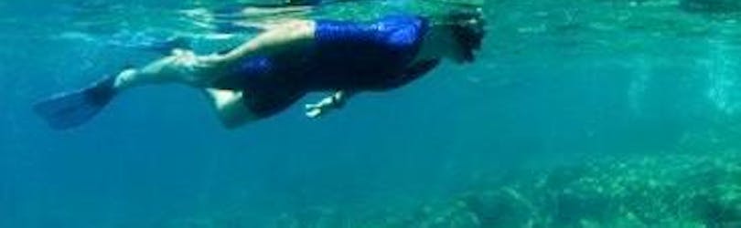 A girl can be seen Snorkeling in Nice with Chango Diving dive centre.