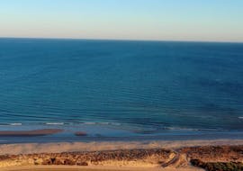 Atardecer en la hermosa playa de Olhão durante el paseo en barco a la Isla de Armona y Praia Deserta con Odyssey Tour.