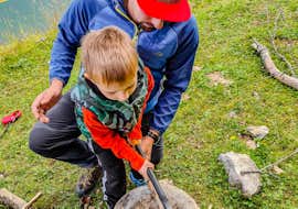 Bushcraft Workshop in Upper Savinja Valley with Funpark Menina - Savinji A boy and his father at the Bushcraft Workshop in Upper Savinja Valley.