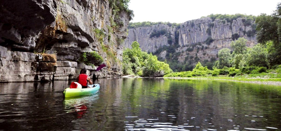 Someone is doing kayak on the river during the 7km Kayak & Canoe Tour on the Chassezac River with Céven'Aventure Ardèche.