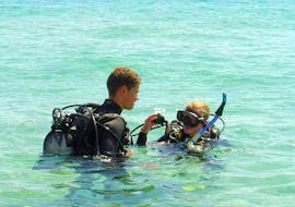 A man and his younger sister are Snorkeling around Hyères with European Diving School Hyères.