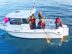 A group goes reef fishing in Portimao with Atlantis Tours Portimao.