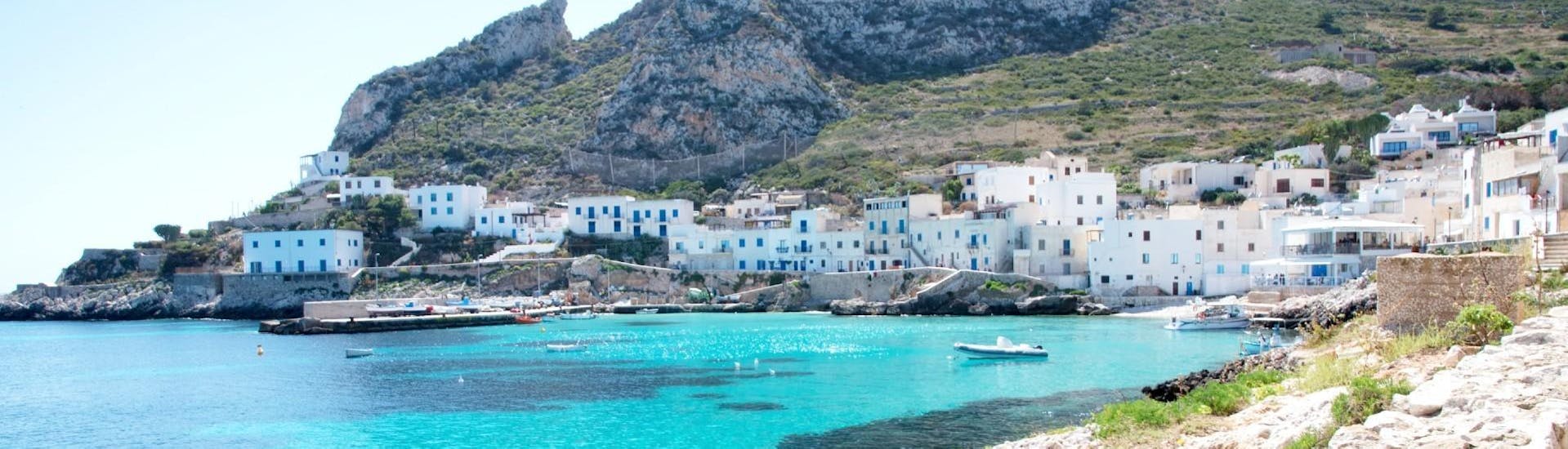 The stunning island of Levanzo that you can visit during the boat trip to Favignana and Levanzo with Lunch with Egadi Escursioni.