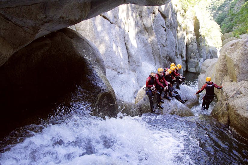 Group of people doing canyoning in the Gourgas Canyon in Ardèche with Geo Canyon.
