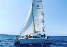 A private catamaran sails to Formentera from Ibiza with CharterAlia Ibiza.