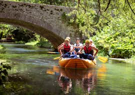 Rafting on the Corno River in Norcia - Short Route with Rafting Umbria A group of friends enjoy the view of the Valnerina nature from the river during a tour of rafting on the Corno river - short route with Rafting Umbria.