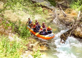 A raft of Umbria Rafting is descending along the Corno river during a Rafting tour on the Corno River - Long Route.