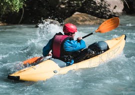 The participant is moving fast during the Pack-Rafting on the Adige River in Val Venosta with Adventure Südtirol.