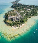 An aerial view of the medieval ruins you can see during the boat trip along Lake Garda's Western Coast with Bertoldi Boats.