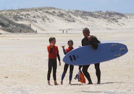 Kids doing surfing lessons for kids on Biscarrosse Beach with la Vigie.  