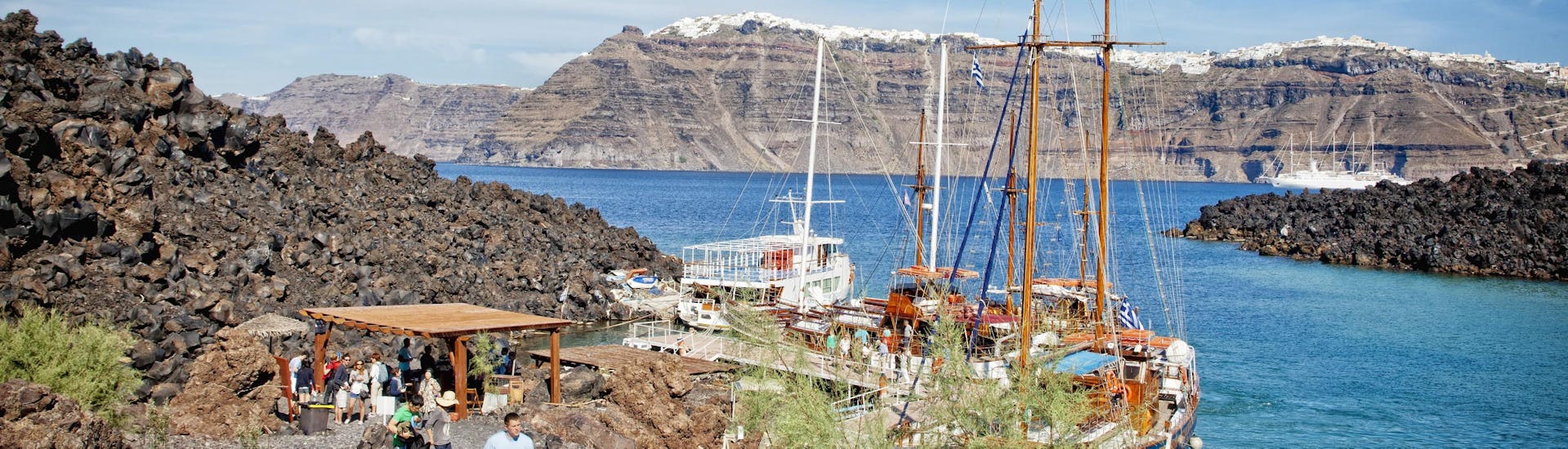People disembark Caldea's boats boat trip to the volcano and Thirassia Island in Santorini. 