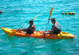 People Sea Kayaking at Faliraki Beach with Sotos-Watersports.
