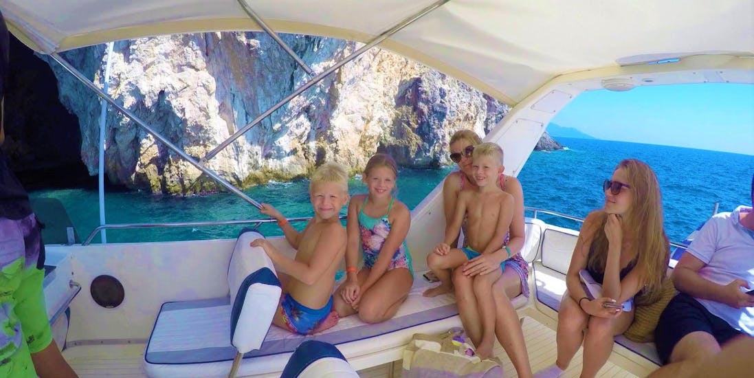 A family goes on a boat trip to Paxos & Antipaxos with Asprokavos Watersports.