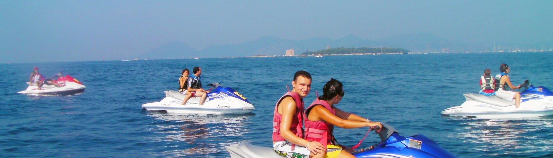 Couple doing a Jet Ski Safari from Nice to Lerins Islands with Jet Evasion.  