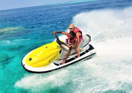 Two people go on a jet ski ride in Rethymno Beach in Crete with Popeye Watersports.