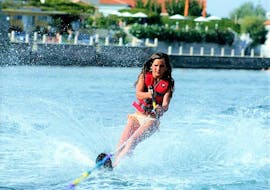 A girl goes wakeboarding in Kavos with Asprokavos Watersports.