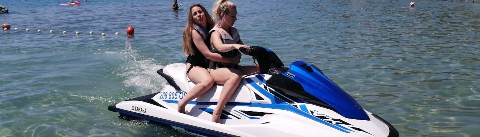Two woman are on a jet ski hired from Adventure Croatia.