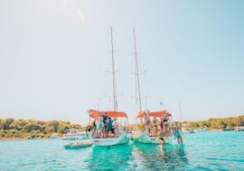 A group jumps to the sea during a half day sailing trip around Zadar with The Day Sail Croatia.