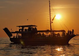 The sky turns orange during the Sunset Boat Trip around Poreč with Dolphin Watching from Kristofor Boat Excursions Poreč.