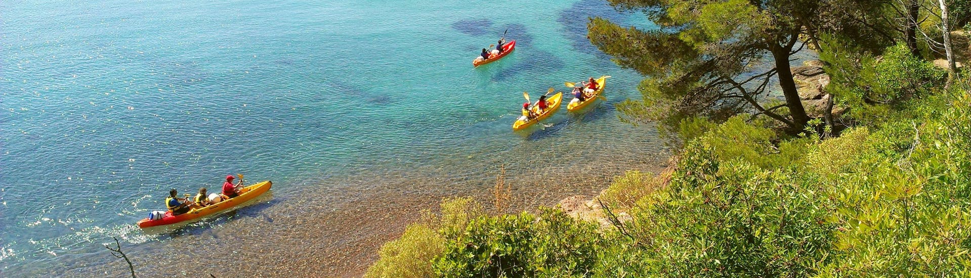 Several People kayaking during their Sea Kayak Hire in Cannes with Sea First.