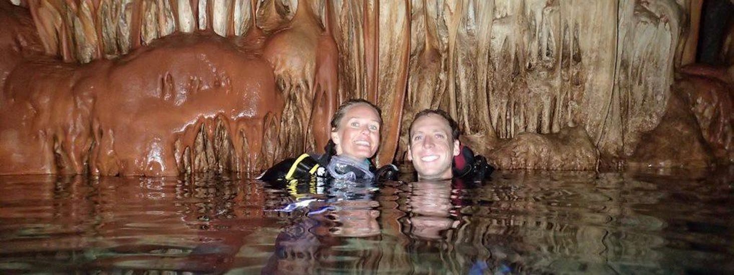 Two people on a guided dive in the Elephant Cave in Chania with Omega Divers.