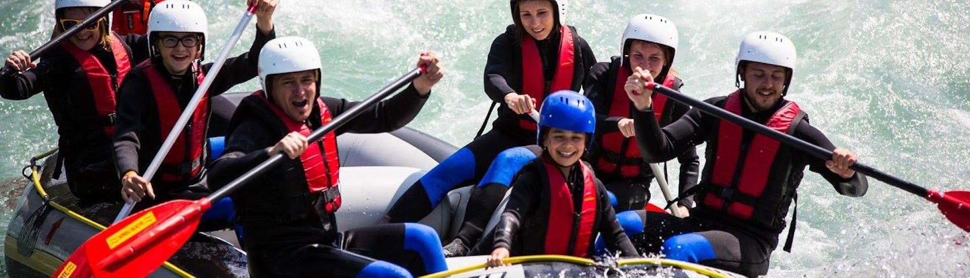 A family is enjoying a rafting tour in Zillertal as a part of their Rafting & Canyoning Package - Ziller & Blue Lagoon Light with Freiluftakademie Zillertal.