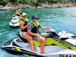 Group of people have fun while doing a Jet Ski Safari to the Blue Cave from Rakalj with Istria Adventure. 