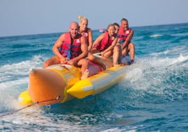 People doing a Banana Boat Ride and More Towable Tubes in Stalida in Crete with SlalomWater Sports.