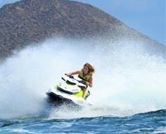 A woman goes on a jet ski ride at Mil Palmeras Beach with BaliserMar.
