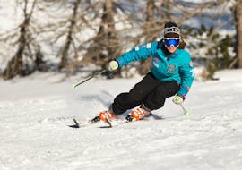 An excited participant enjoying the private ski lesson with Scuola di Sci Monti della Luna San Sicario.