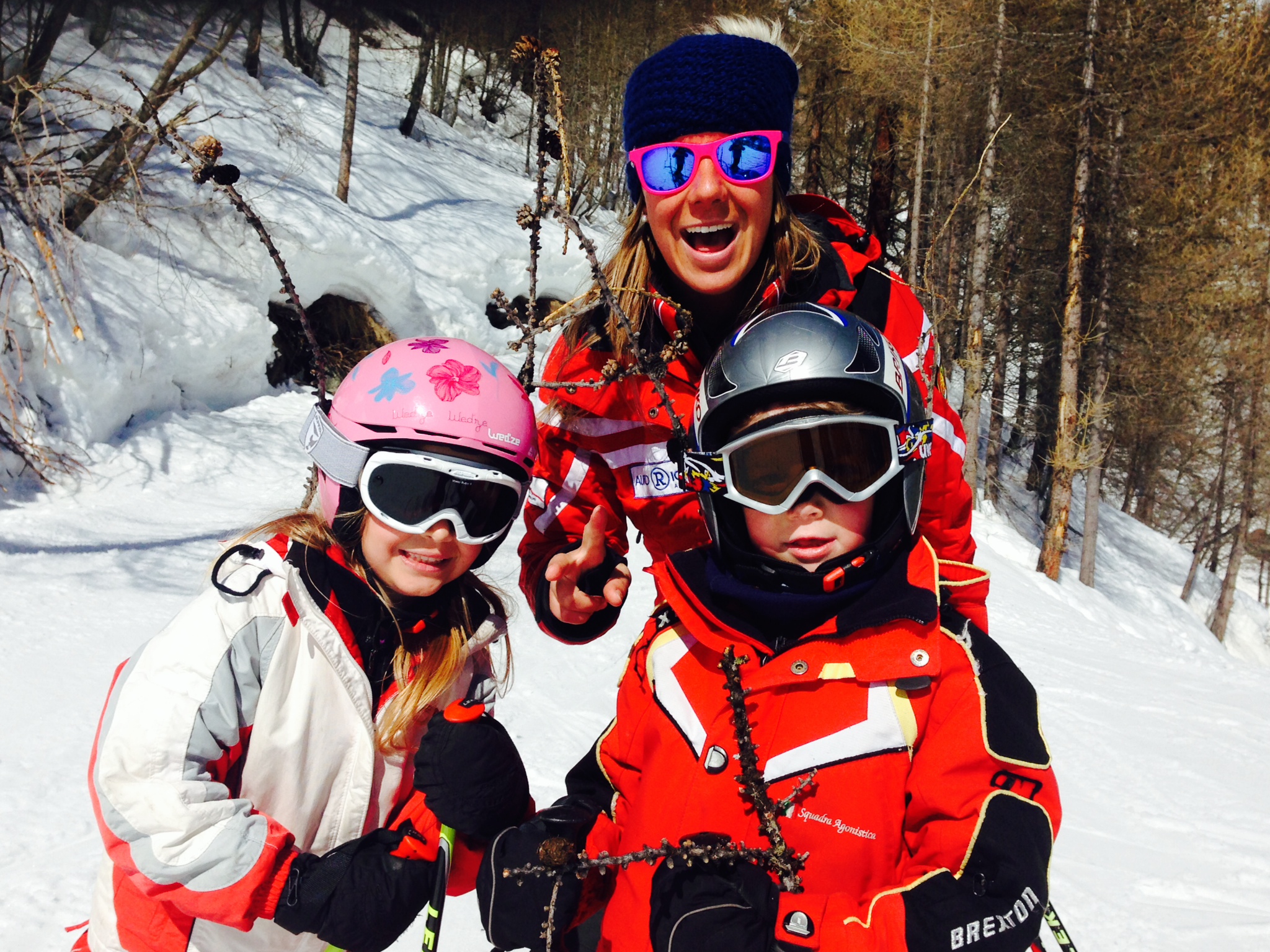 Ski instructor with kids in Gressoney during one of the Kids Ski Lessons (5-15 y.) for All Levels.