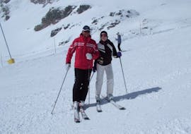 Ski instructor and participant in Gressoney during one of the private ski lessons for adults of all levels. 