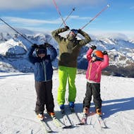 Two kids and a instructor during a private ski lesson in Astún with FreexDay ski school.