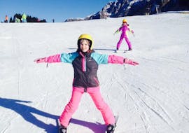 Kids taking part in the kids ski lessons for all levels in Madonna di Campiglio.